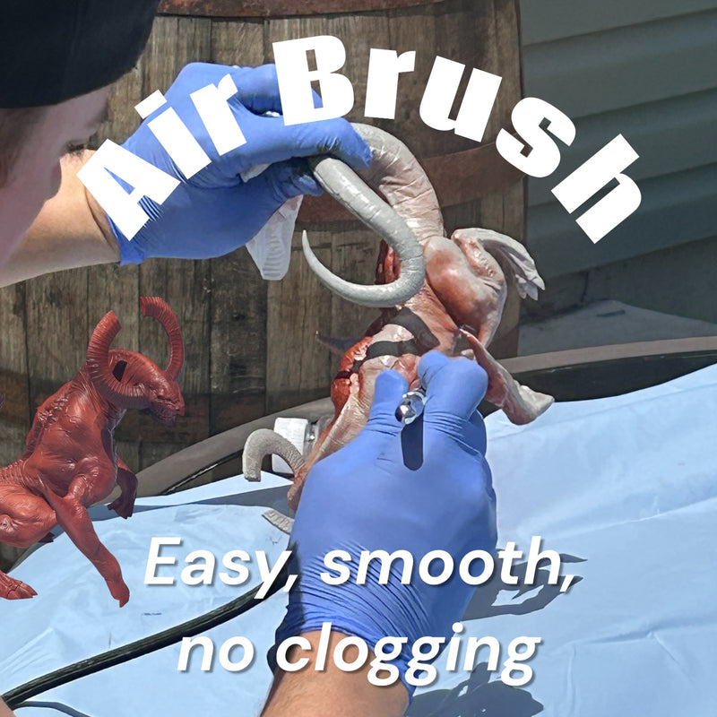 Airbrushing a miniature with InstantEffect paint for easy smooth coverage